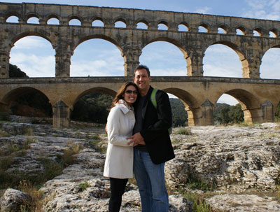 Carolyn and Philip Marr in front of the ancient Roman aqueduct, Pont du Gard.