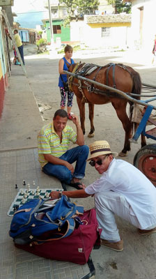 Locals playing chess in the colonial town of Trinidad — Cuba. Photo by Randy Keck