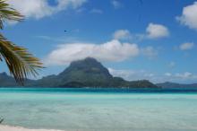 Bora Bora with the famous Mt. Otemanu covered by a cloud.