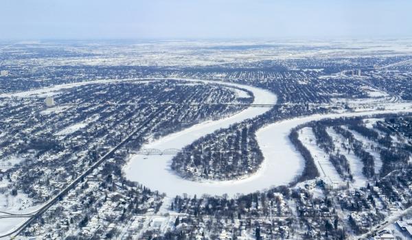 A frozen river winds through Winnipeg.