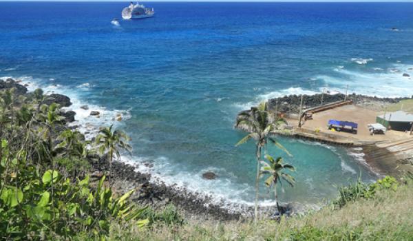 The <i>Aranui 5</i> anchored off Bounty Bay, Pitcairn Island. Photo by Jim Hamel