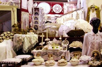 Handmade lace in Belgium can be pricey, but it’s a characteristic, packable souvenir. Photo by Rick Steves