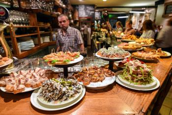 At Basque-style tapas bars, pintxos are already laid out, so you can simply point to or grab what you want. Photo by Cameron Hewitt