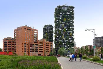 Milan’s redeveloped Porta Nuova neighborhood shows visitors a modern side of the city, including two tree-covered skyscrapers. Photo by Rick Steves
