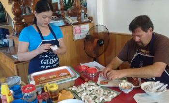 Making white rose dumplings at Gioan Cooking School.