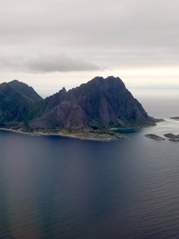 Mountains thrusting out of the sea, a typical Lofoten scene.