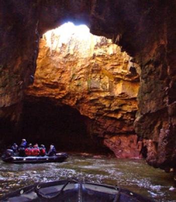 Exploring a cave on Papa Stour, one of Scotland’s Shetland islands. Photo courtesy of Adventure Canada