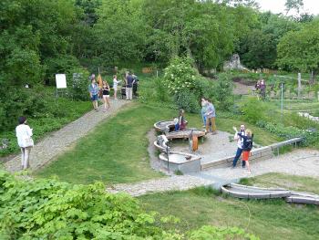 Visitors wandering through the Playful Garden.