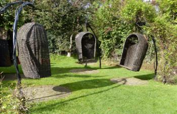 Basket swings in the children’s glade of the Imbolc garden. Photos by Yvonne Michie Horn