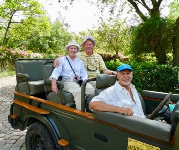 Marvin Silverman (seated in the back) headed out on a game drive with friends Renee and Howard Schlesinger.