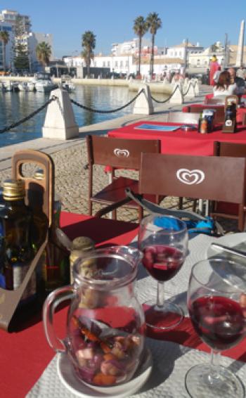 Enjoying sangria at the edge of the marina in Faro, Portugal. Photo by Randy Keck