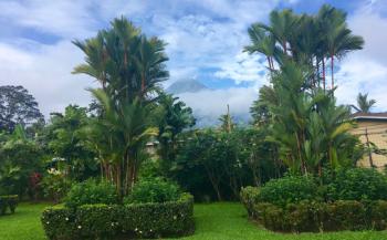 Arenal Volcano making a rare appearance through clouds. Photo by Glenn Schmidt from his hotel in La Fortuna