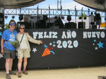 Rod Smith and his wife, Karen Heady, in front of the stage overlooking Puerto Villamil's main street.