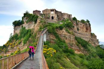 A footpath is all that connects Italy’s Civita di Bagnoregio to the “mainland.” Photos by Dominic Arizona Bonuccelli