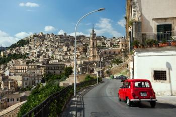 Brace yourself for driving in Italian cities like Modica in Sicily. Drivers may be more aggressive than you’re used to. Photo by Dominic Arizona Bonuccelli