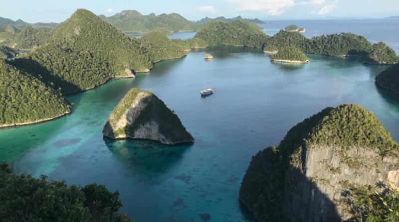The <i>Shakti</i> in a lagoon in Raja Ampat. Photo by Donna DeGaetani