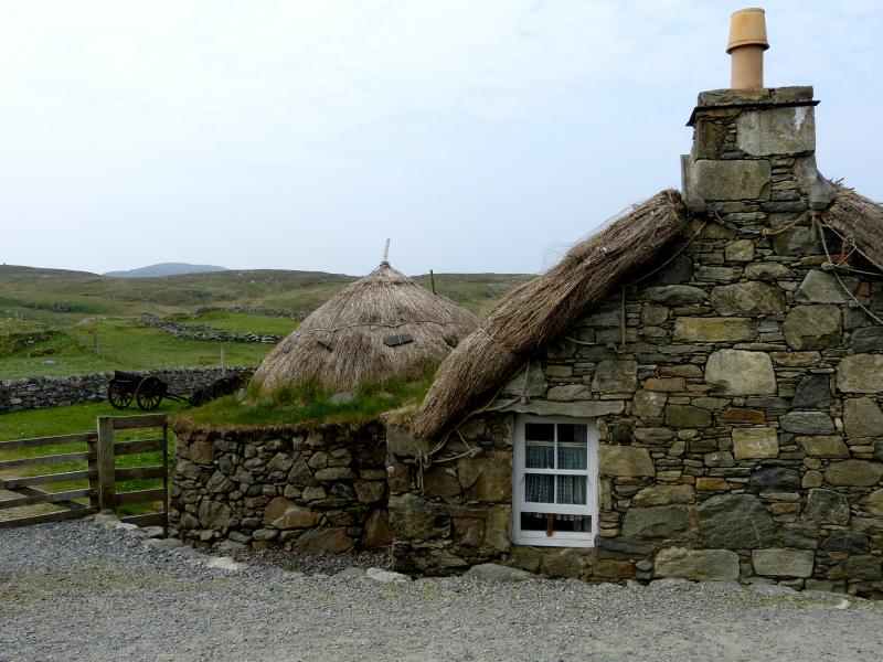 Thatch-roofed croft houses in the village of Gearrannan on Lewis Island, the largest of the Outer Hebrides.