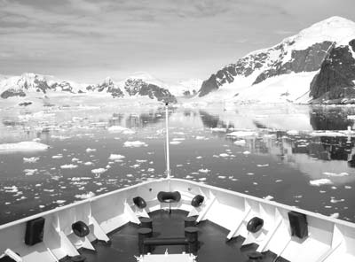 The World Discoverer cruises through the Lemaire Channel.