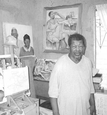 Artist Benjamin Nicholas in his studio in Hopkins Village, Belize.