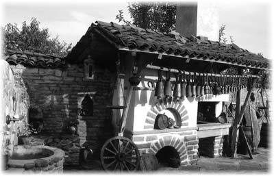 Sets of cowbells, each with a different tone enabling shepherds to locate individual animals, adorn the courtyard of our pension in Jeravna.