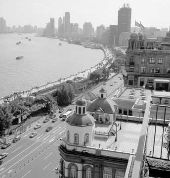 The rooftop patio of the historic Peace Hotel provides great views overlooking The Bund riverfront — Shanghai.