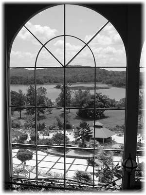 One of several arched windows at the new Gamboa Rainforest Resort frames the lakeside setting just off the Panama Canal. Resorts such as this cater to vacationers in a way not done prior to Panama’s gaining control of the former Canal Zone.