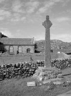 Low rocky walls, lush green grass and soaring Celtic crosses — welcome to Iona. Photo by Jennifer Hauseman