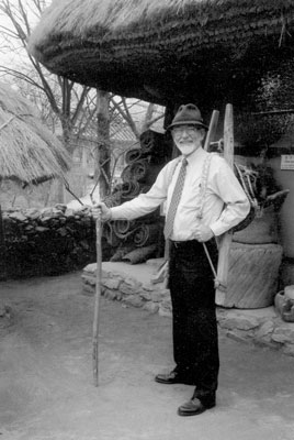 At the Korean Folk Village, Carlton McKinney tries on an A-frame. 