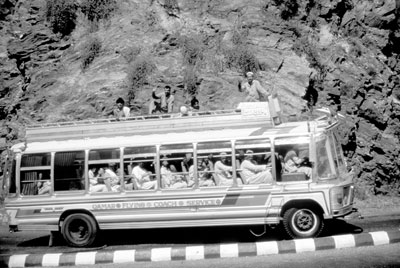 Omar’s Flying Coach bus on the beginning section of the Karakorum Highway in northern Pakistan.