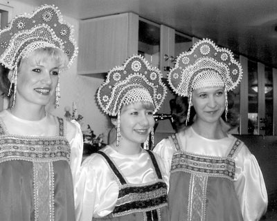 Wait staff dressed for a festive dinner on board the Zosima Shashkov.