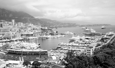 The Crystal Symphony (right center) alongside the quay in Monaco. Note the temporary stands (left foreground) set up for the running of the Gran Prix of Monte Carlo. Photos: Toulmin