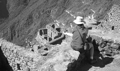 A member of our group contemplates the Machu Picchu ruins.