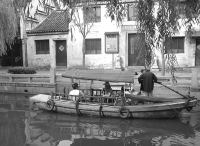 Old houses and canal boats are common sights throughout Zhouzhuang.