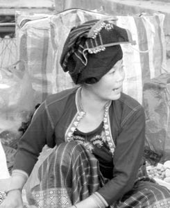 Hmong saleswoman at Luang Prabang night market. Photos: Levi