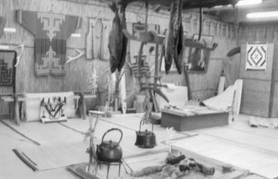 Salmon hang to dry in this Ainu reed house. Photo: McClure