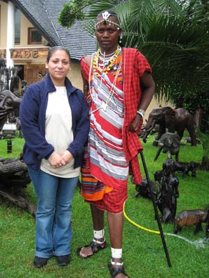 My daughter, Katie, my photographer on this safari, with a young Masai in Arusha, Tanzania.