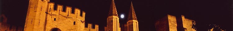 Full moon over the Palace of the Popes in Avignon. 