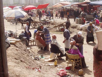 Fresh-air barber shop in Kashgar.