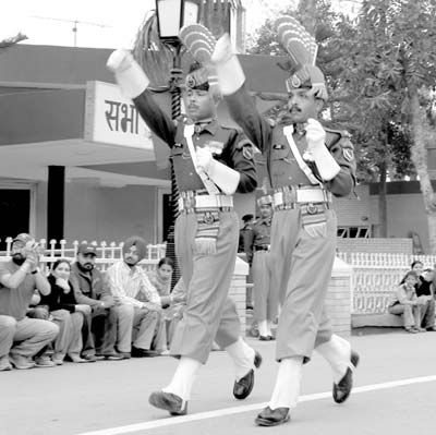 Indian soldiers marching, with VIP curb seating in the background. Photo: Jane B. Holt