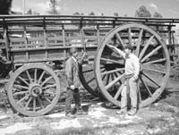 Randy and Sebastian inspecting one of the oversized wagons used by settlers in northern Patagonia in the early 1900s.