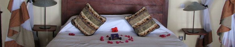 The bedroom of our cottage at Tongabezi Lodge in Zambia.