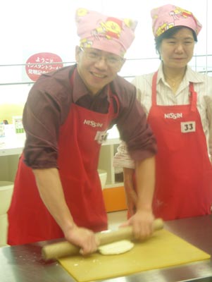 At Kobe’s Handmade Chicken Ramen Hands-On Workshop, journalists donned pink head scarves and red aprons and produced some of  this favorite snack.