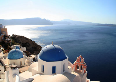 View of the must-see village of Oia, on the north end of Santorini, Greece.