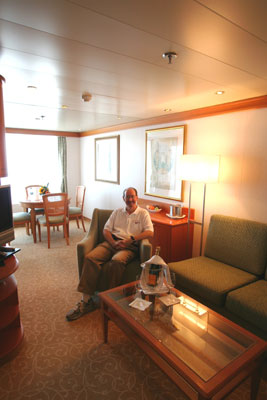 Lew Toulmin in the living room of his Navigator Suite aboard the Seven Seas Navigator.