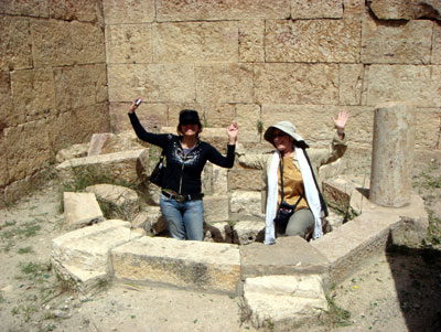 Linda, a local, and Harriet at the Baptistry in Tébessa.