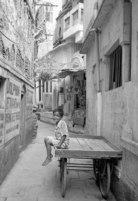 A smiling youngster greeted those who passed in a narrow walkway near the Ganges in Varanasi. Photos: Keck