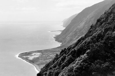 Along the cliffs of São Jorge, with the village of Fajã dos Cubres at the bottom.