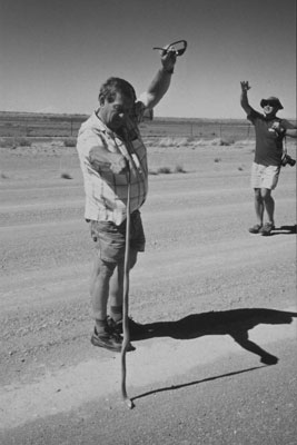 Our driver, Eddie, stretches out a cobra. Photo: Strampe