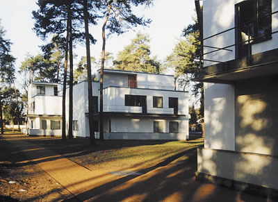 These Masters’ Houses in Dessau were designed by Walter Gropius for the occupancy and work of Bauhaus Masters (professors). Photo by Wolfgang Große, courtesy of Stadt Dessau-Roßlau) 