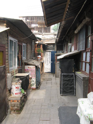 Walkway separating apartments inside a Beijing courtyard house.